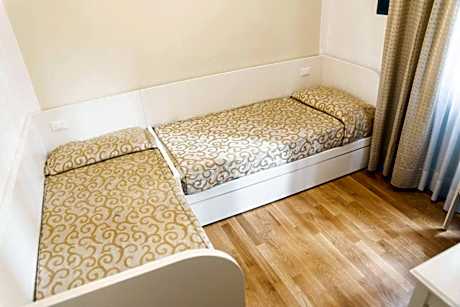 Queen Room with Shared Bathroom