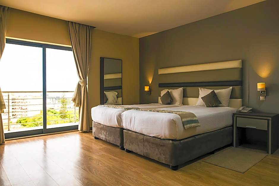 Foto 1 di 5 di Deluxe 1 Double Bed or 2 Beds