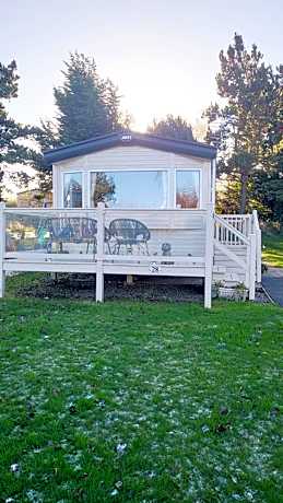 Caravan under the tree, Seton Sands