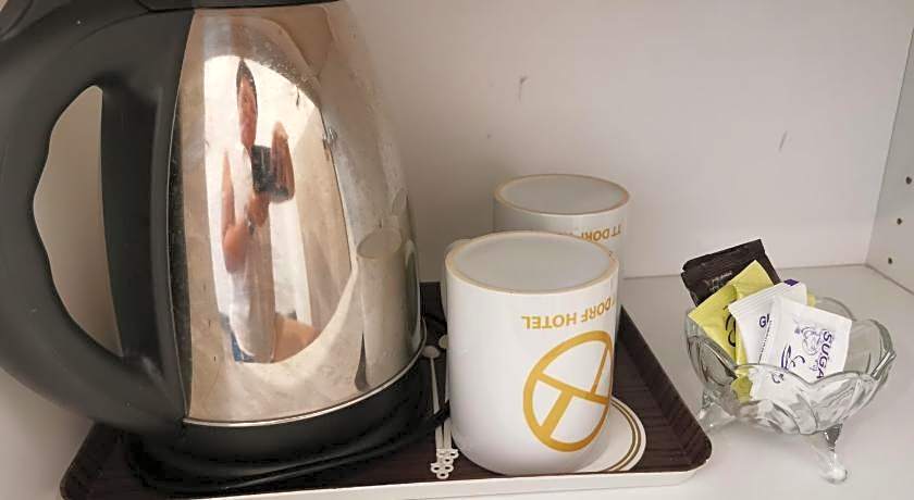 OYO 44099 Tt Dorf Hotel