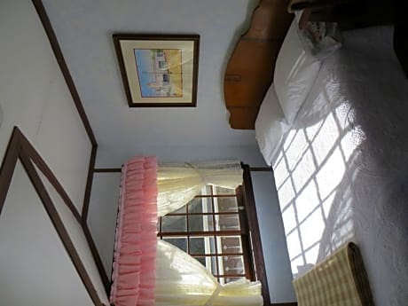 Double Bed with Shared Bathroom