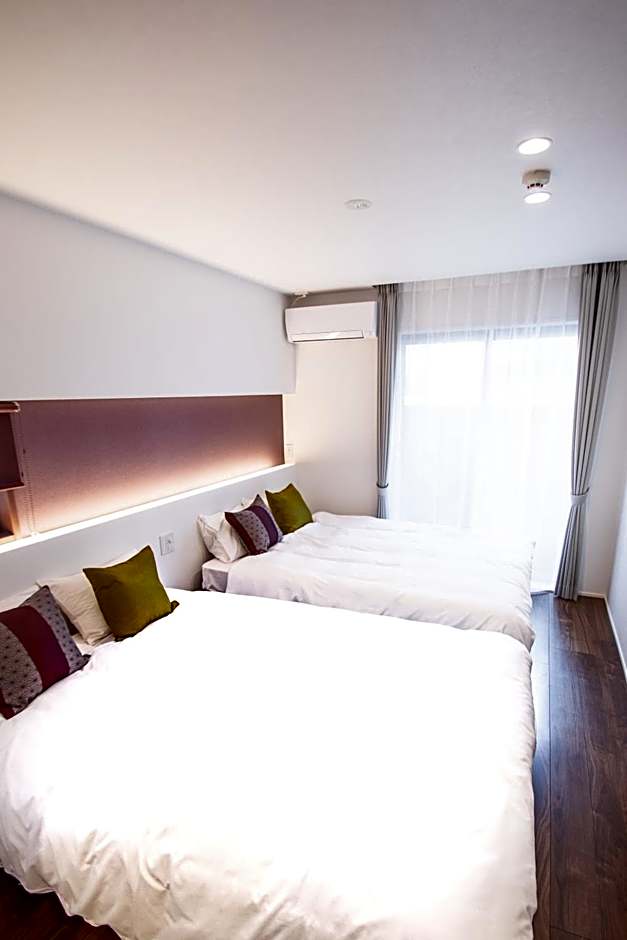 Apartment Hotel Tenjin TUMUGU