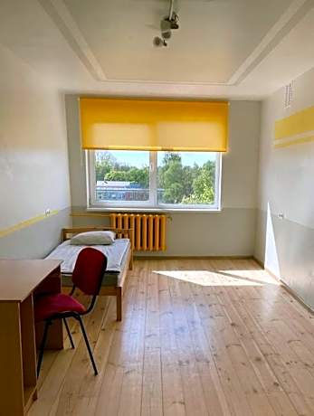 Single Bed in Dormitory Room