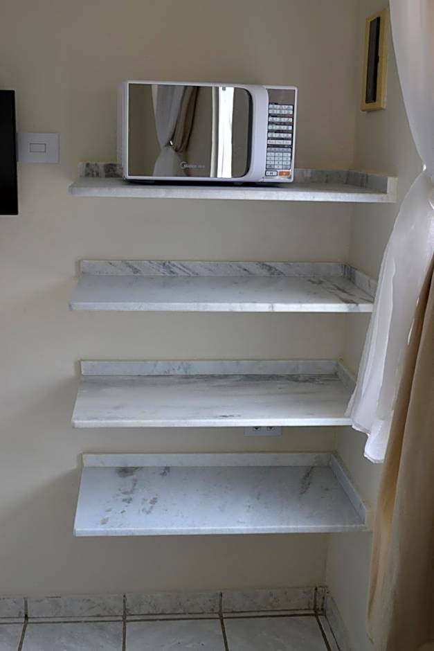 Casas em Condomínio próximo da praia com 2 dormitórios, churrasqueira e 3 vagas de garagem