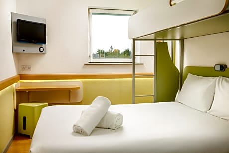 Standard Room With A Double Bed And A Single Bed