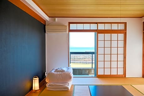 Japanese Style Family Room With Shared Bath