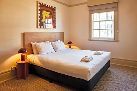 Deluxe King Room with Shared Bathroom