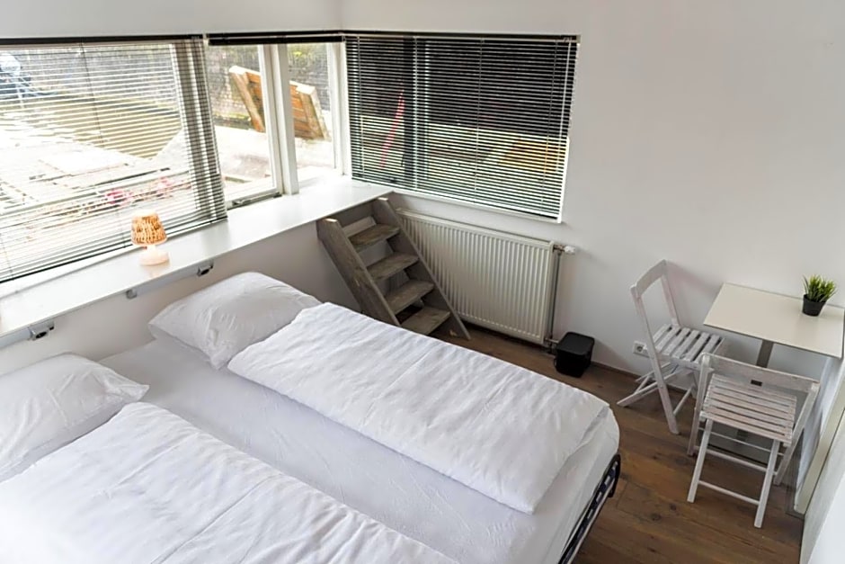 HouseBoat next to AMSTEL