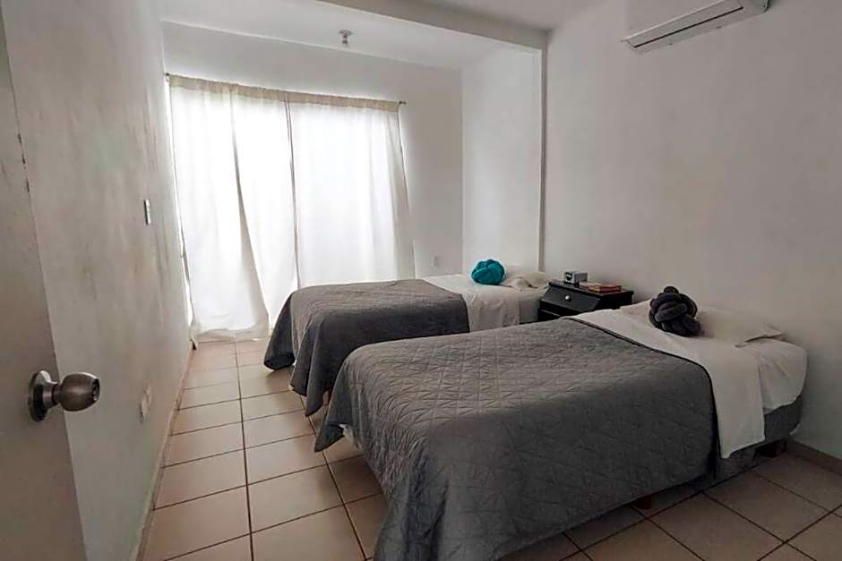 Hogar tranquilo, cerca de marina y plaza comercial