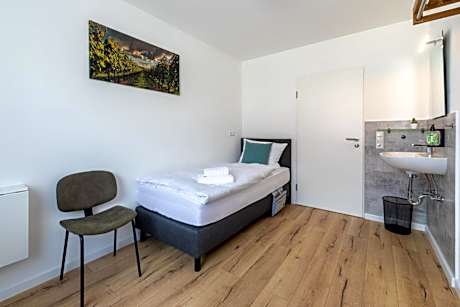 Single Room with Shared Shower and Toilet