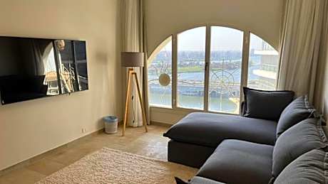 Nile and pyramids view 4BR apt