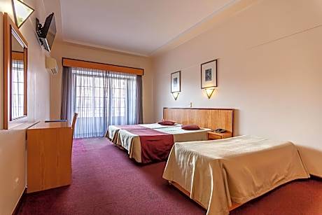 Twin Room with Extra Bed (2 Adults + 1 Child up to 12 years old)
