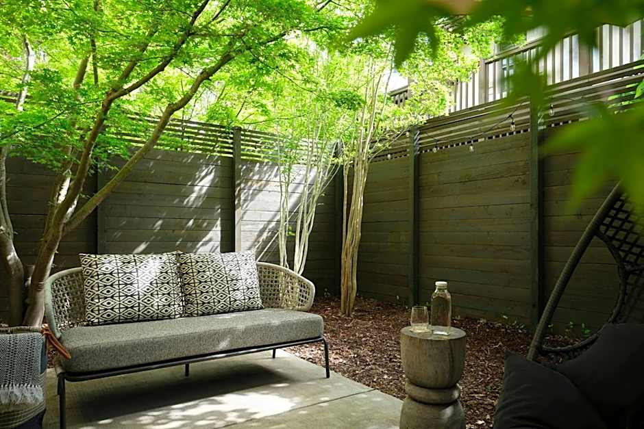 Photo 1 of 9 of Junior 1 King Bed with Sofabed Cottage, Patio