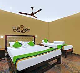 Treebo Grace Inn, 3 Min Walk From Promenade Beach