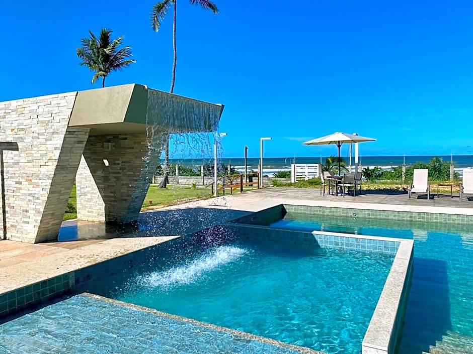 Refúgio Pé na Areia com 4 quartos em Ilhéus - Condomínio Perfeito para Família!