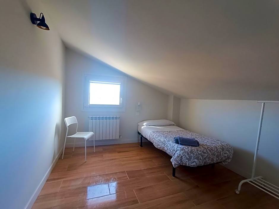 Photo 1 of 12 of Single Room with Shared Bathroom