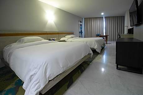 Double Room with Two Double Beds and Beach View