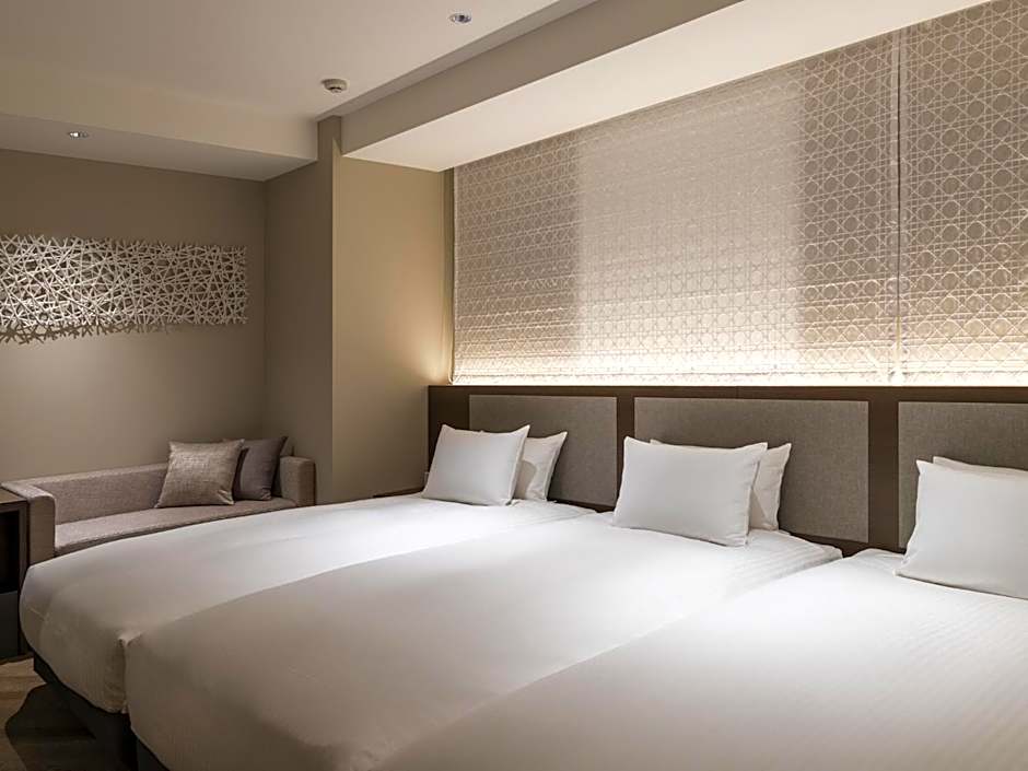 Photo 1 of 9 of Triple Room (2 Adult)
