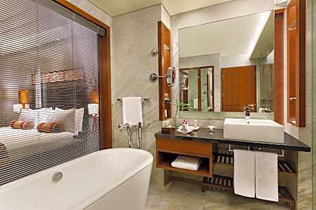 One-Bedroom Suite with Pool View - Lounge Access with 15% discount on Food & Beverages, 15% off on Spa Services