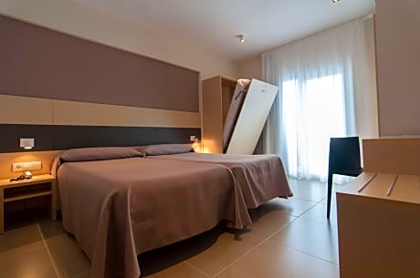 Triple Room (2 Adults + 1 Child)