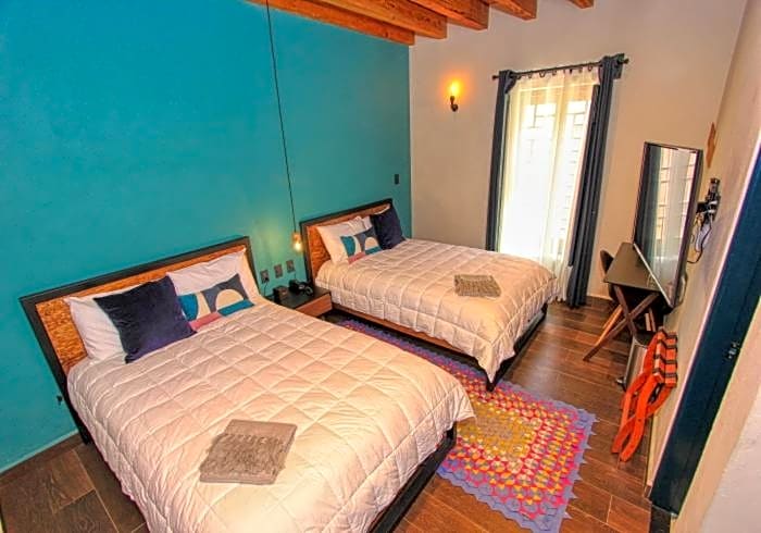 Antigua Trece Hotel Fusión