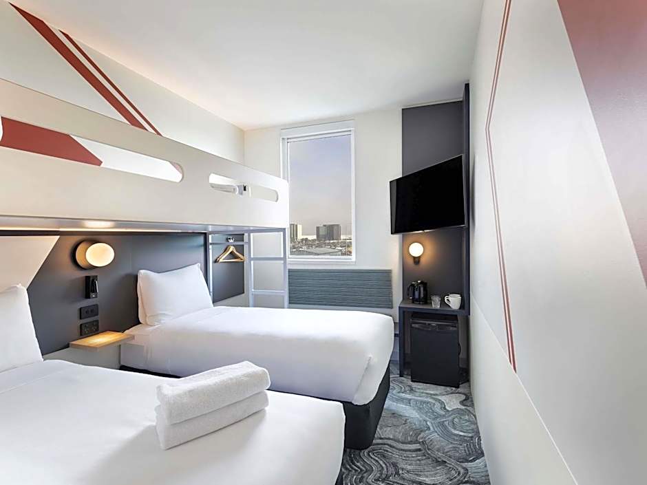 Photo 1 of 6 of Standard Room with Two Single Beds and One Bunk Bed