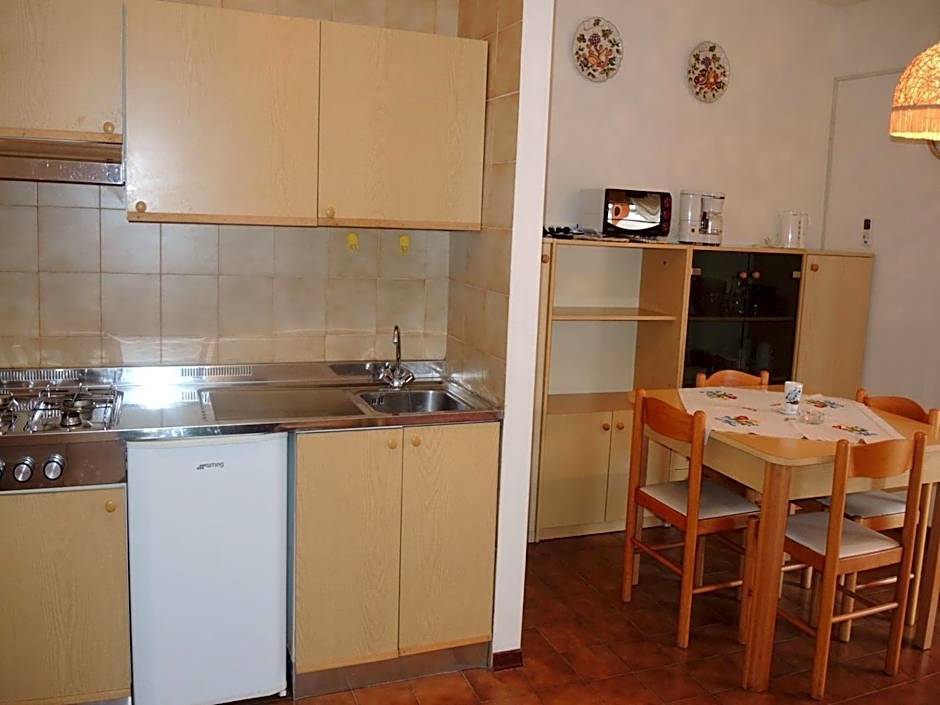 Warm two-room flat with terrace near the beach