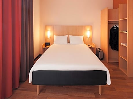 Room with One Double and One Single Bed