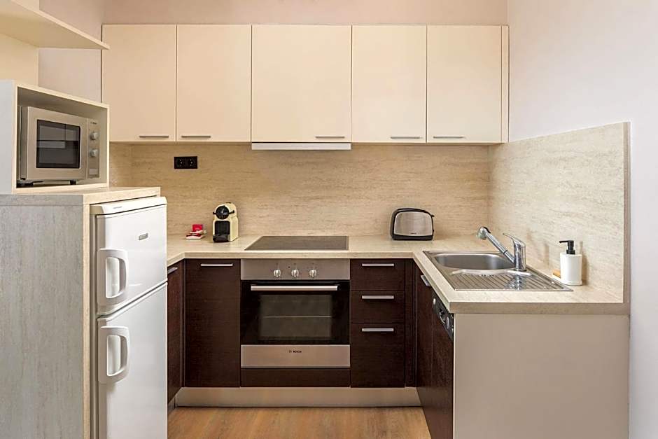 Escala Hotel & Suites