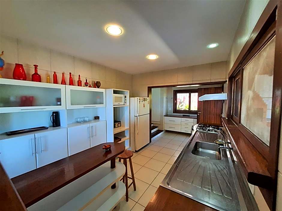 3Suítes, piscina e vista do mar em condomínio pé na areia - pátio compartilhado