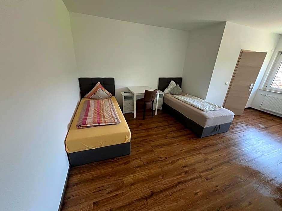 Pensionszimmer mit Gemeinschaftsküche