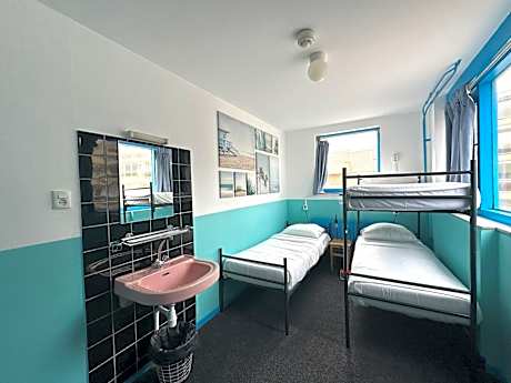 Single Bed in Female Dormitory Room