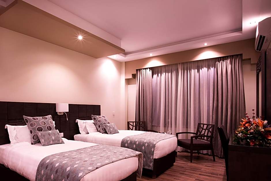 Bidwood Suite Hotel, Opposite Sarit Centre