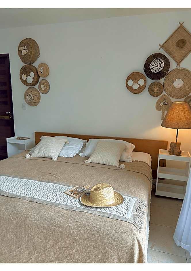 Casa Ilha| beira mar, piscina aquecida, 4 suítes