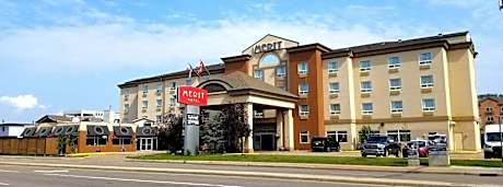 Merit Hotel & Suites