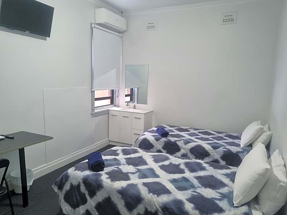 Photo 1 of 1 of Twin Room with Shared Bathroom