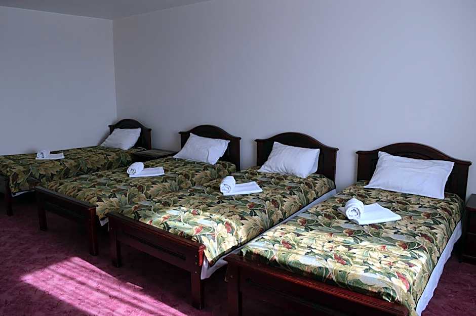 Photo 1 of 3 of Quadruple Room