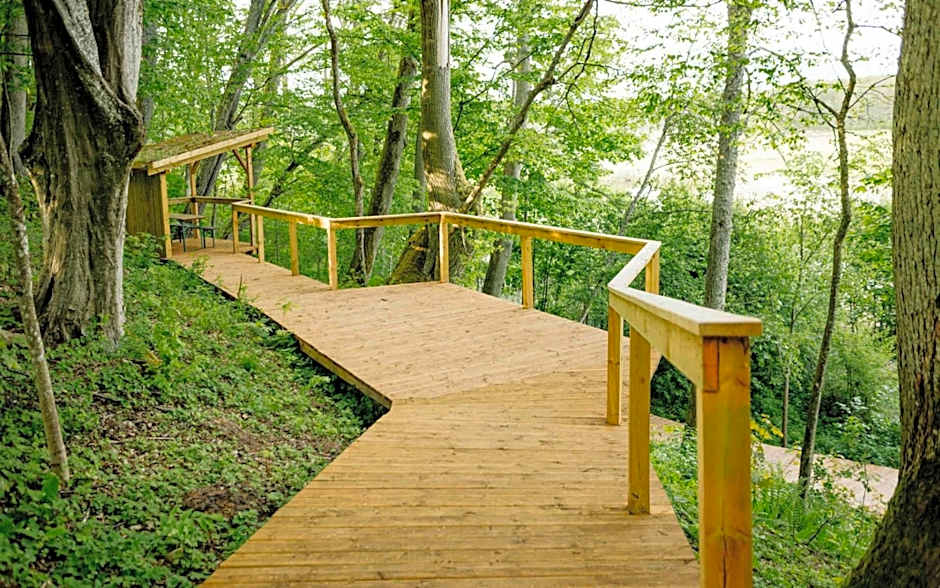 Pustelnia Supraśl - domki nad rzeką