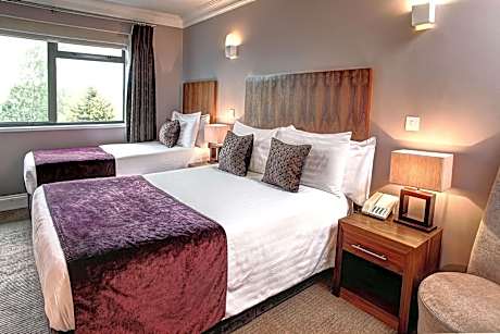 Large Room with One Double and One Single Bed