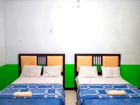 Puspa Tiara Syar'i Guci Mitra RedDoorz