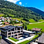 Emma Deluxe Aparthotel, Aircondition, ganzjährig beheizter Außenpool & Skibus direkt vor der Tür