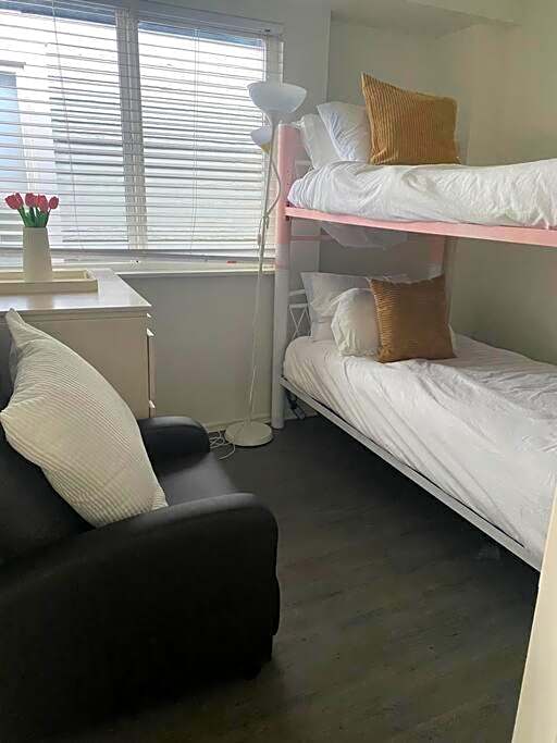 Room in an upper level 4 bedroom-1bathroom home on a quiet tree lined street