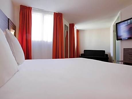 Standard Suite with one double bed and two single beds