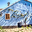 Viscri 32 - White Barn and Blue House