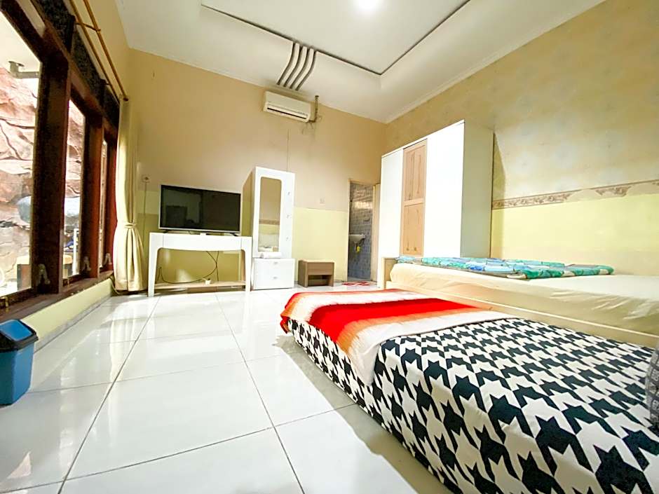 Homey Guesthouse near Sby Zoo (Syariah) 