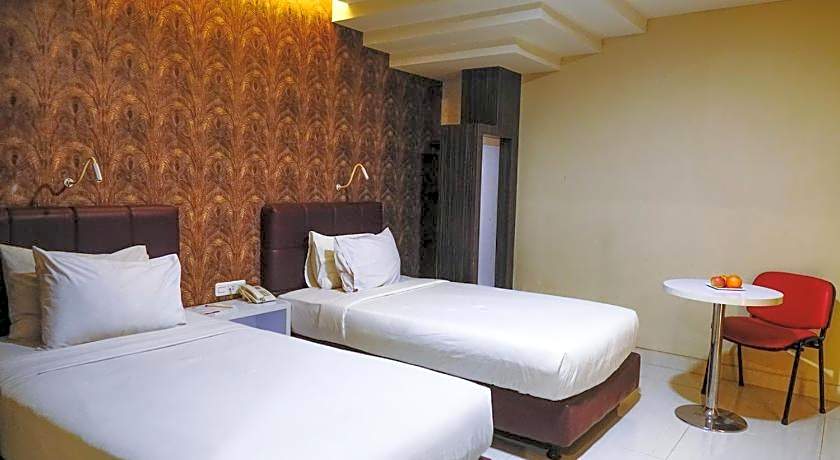 Empress Hotel Makassar City Center by LIFE