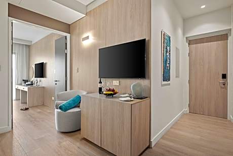Superior room with double bed, sofa and balcony