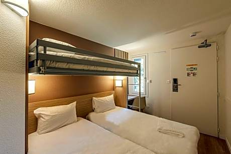 Triple Room (2 Single Beds + 1 Bunk Bed)