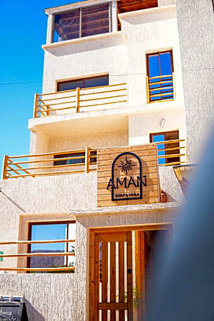 Aman surf paddle yoga
