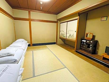 Quadruple Room with Shared Bathroom